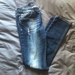 Vigoss skinny jeans medium wash with rip detail